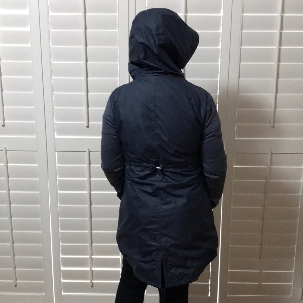 This is a very attractive active wear light weight jacket just above the knees.